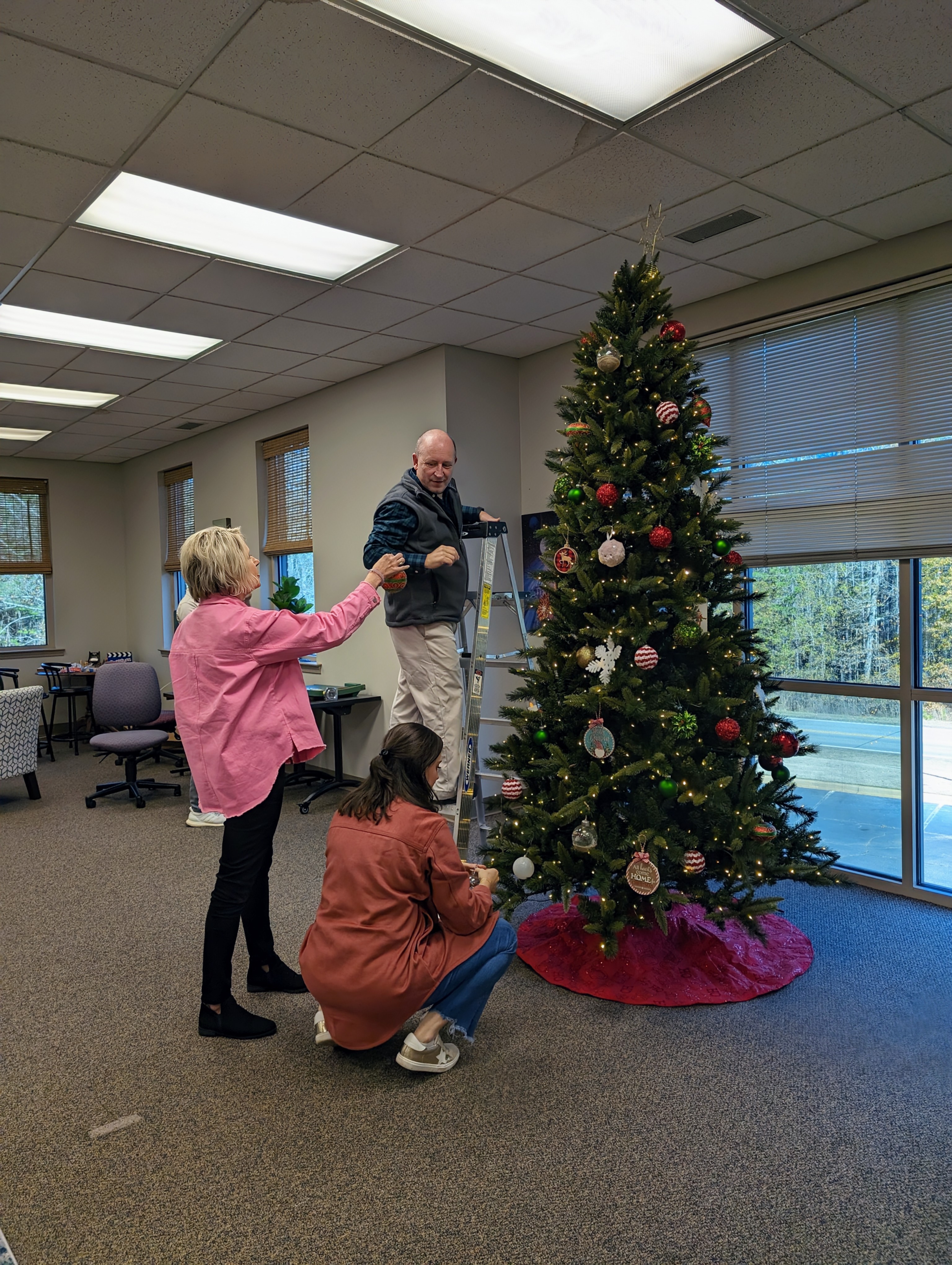 decorating the Christmas tree in 2024